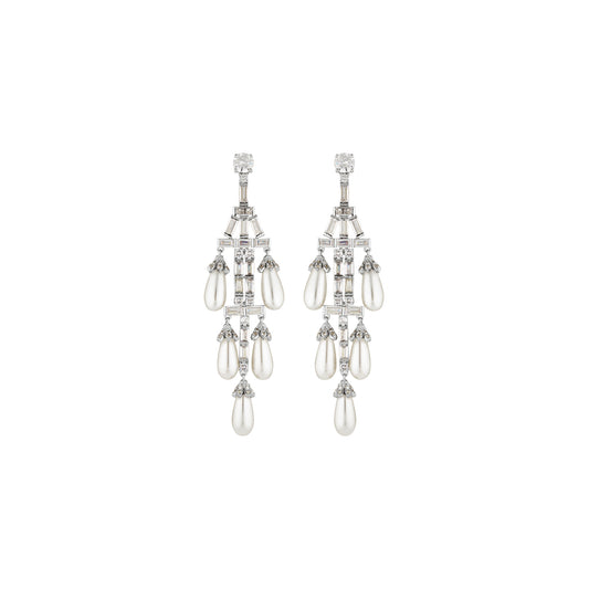 Swanson in pearl earrings