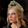 The Bernhardt Headpiece